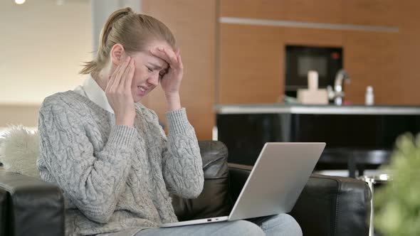 Tired Young Woman with Headache Working n Laptop at Home 