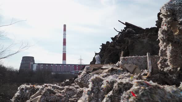 Big piles of garbage. Empty bottles, plastic in the waste dump. ecological disaster