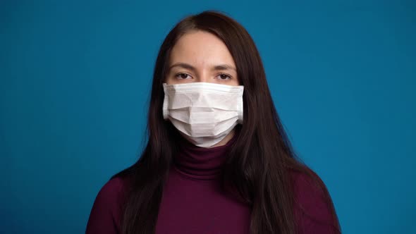 Woman Feeling Sick and Wearing Mask