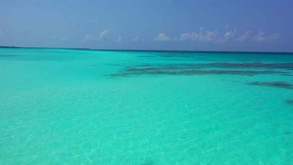 Aerial top view travel of relaxing resort beach wildlife by blue ocean with white sandy background o