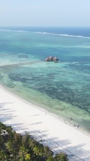 Tanzania  Vertical Video House on Stilts in the Ocean on the Coast of Zanzibar Slow Motion