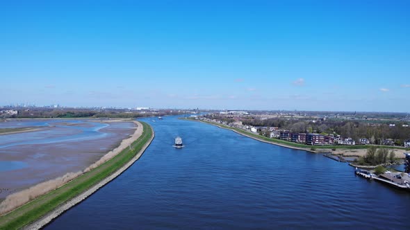 Industrial Barge Travelling At Noord Bridge Near The Town At Hendrik-Ido-Ambacht, Netherlands. - aer