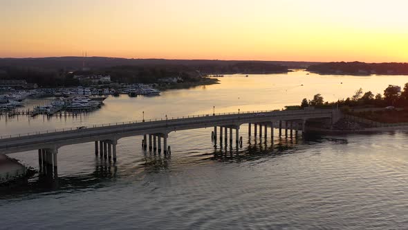 Sunset over a bridge in Sag Harbor, Hamptons, New York, Long Island.Aerial shot.