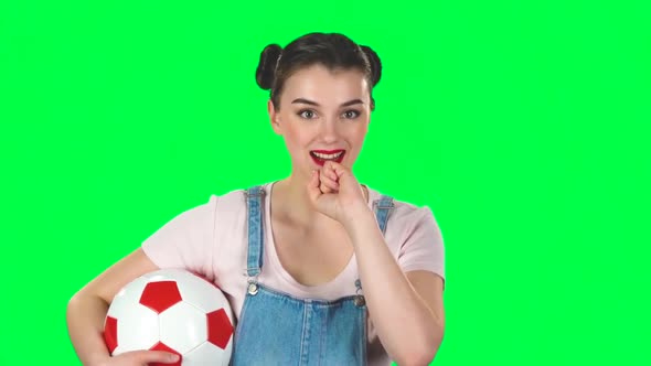 Woman with Football Ball, Cheers for His Favorite Team While Watching the Match on Green Screen