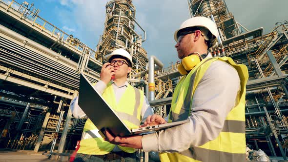 Petroleum Refinery Inspectors are Discussing Industrial Project