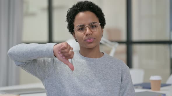 Portrait of Thumbs Down By African Woman, Disapprove