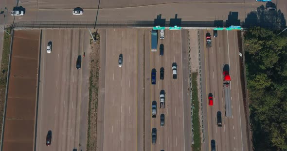 Birds eye view of traffic on 59 South and North freeway near downtown Houston. This video was filmed