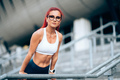 Portrait of attractive red head woman, caucasian woman working out and wearing sportswear - PhotoDune Item for Sale