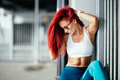 Portrait of fitness girl showing abs during training and working out - PhotoDune Item for Sale