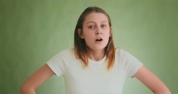 Happy Woman Becomes Disappointed Posing for Camera in Studio