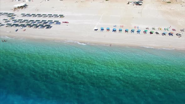 People swimming at beach in Albania