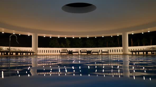 Swimming Pool Lighting At Night. Luxury Stylish Design.