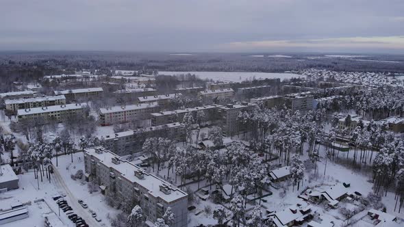 Aerial View of Old Small Soviet City with Lowrise Buildings on Winter Day