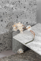 Modern interior composition using various stone textures and a dried flower. - PhotoDune Item for Sale