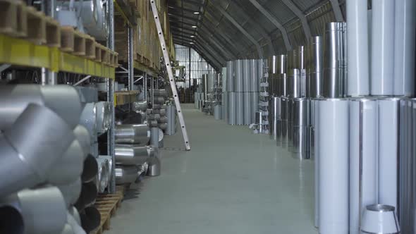 Warehouse with Metal Ready Production. Steel Metal Pipes Stored in Freight Terminal. Steel Industry
