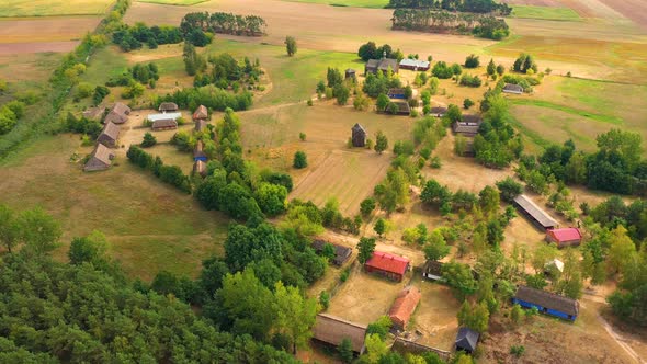 Maurzyce wooden architecture heritage park, antique building in open air museum. Aerial Lowicz, Poln