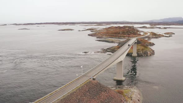 Spectacular View Of Storseisundet Bridge On a Misty Day In Hustadvika, Norway. - Aerial