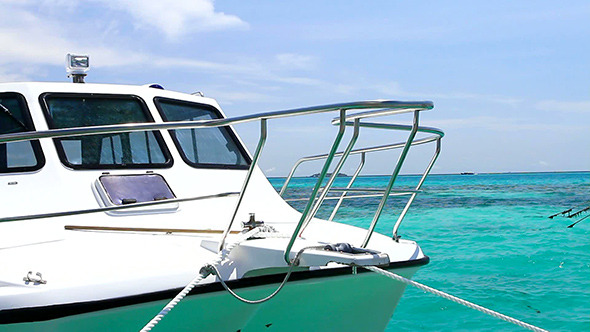 Boat on the Turquoise Maldives Water