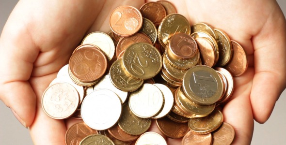 Female With Handful Of Euro Coins