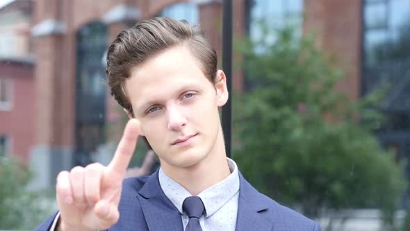 Gesture of No by Waving Finger, Young Businessman Portrait
