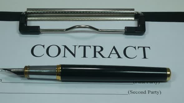 Business Contract And Dollars On The Table