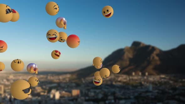 Emoji icons flying over landscape alt