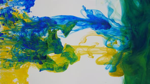 Mixing Blue and Yellow Colors on a White Background alt