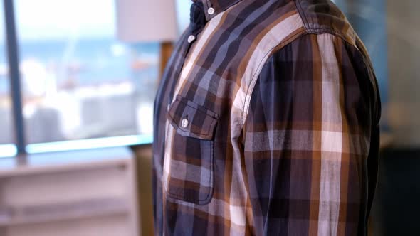 Smiling man standing in the office