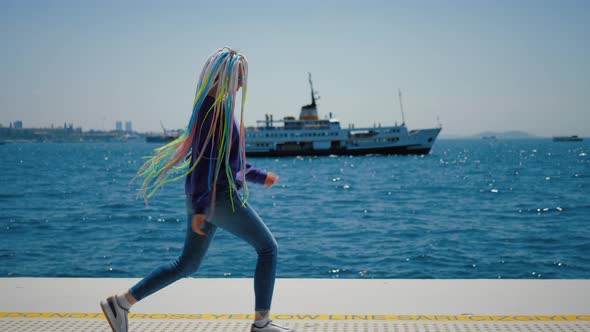 Young Hipster Girl Walking Along Embankment Against Bosphorus Turkey Galataport