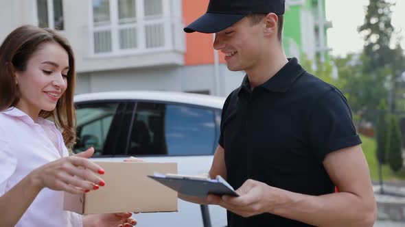 Delivery. Express Courier Delivering Package To Client Home