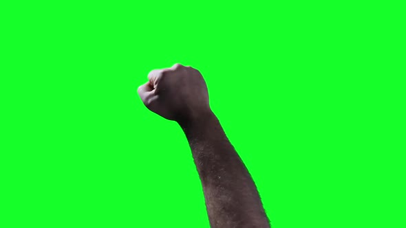 Raised Fist Sign on Green Screen.