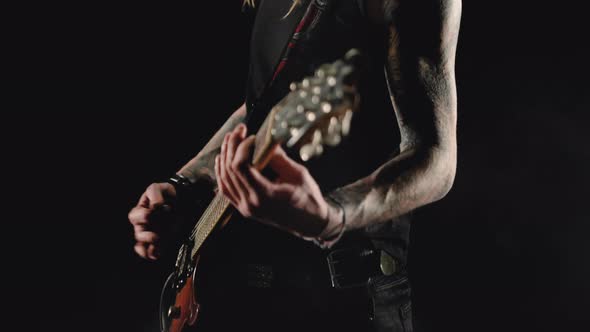 Young Musician Playing Electric Guitar