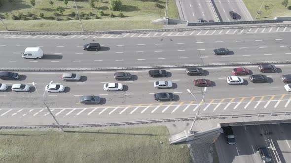 Cars Ride on the Road. Slow Motion. Kyiv. Ukraine. Aerial, Gray, Flat