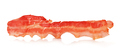 A strip of fried bacon closeup isolated on a white background. Classic american style. - PhotoDune Item for Sale