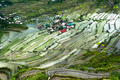 Rice terraces and village houses. Banaue, Philippines - PhotoDune Item for Sale