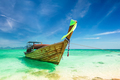 Thai traditional wooden boat at ocean shore Thailand - PhotoDune Item for Sale