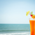 Tequila sunrise cocktail fruits and umbrella decoration at tropical ocean beach - PhotoDune Item for Sale