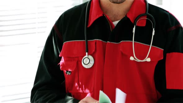 Portrait of male paramedic smiling