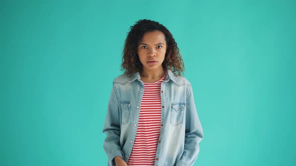 Portrait of Upset African American Woman Feeling Bad After Unpleasant Surprise