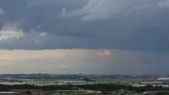 Time lapse dark storm clouds passing above gloomy Toronto landscape