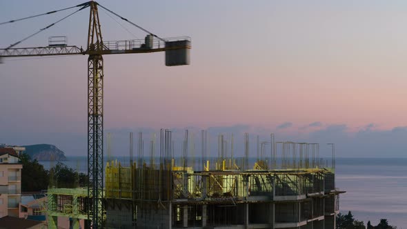 Crane Working in Construction Site alt