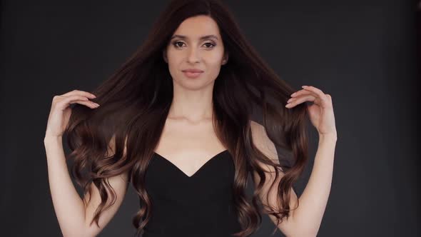 Slow Motion of Gorgeous Brunette with Luxurious Hair