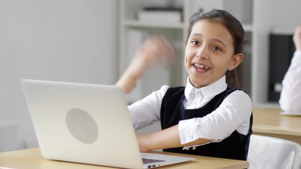 Eager Mixed Race Schoolgirl Answering during Lesson