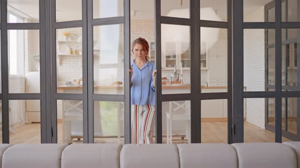 Positive Adult Woman Posing in Living Room