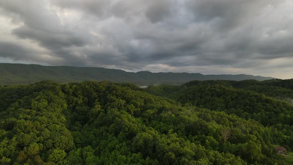 4K Scenic Mountains Aerial Clip Dramatic Clouds