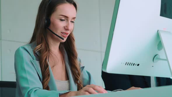 Business People Wearing Headset Working in Office