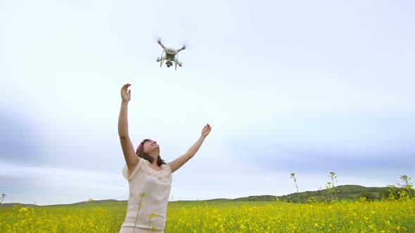 Launching Drone in a Rape Field