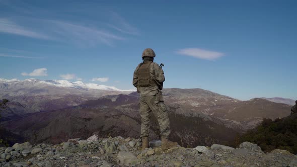 Soldier Watching Around On The Mountain 4K alt