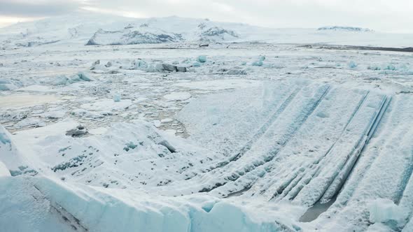 Aerial View of the J Kuls Rl n Glacial Lagoon and Floating Icebergs. The Beginning of Spring