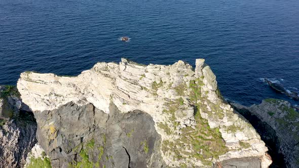 Flying Above the Cobblers Tower at Glenlough Bay Between Port and Ardara in County Donegal is